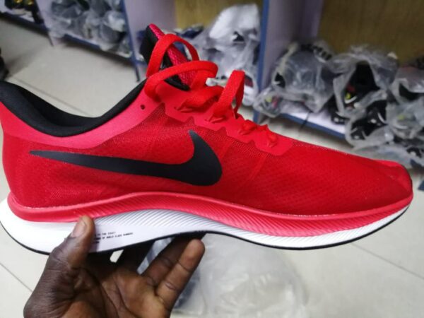 Red Nike Zoom sports shoes