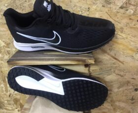 Black Nike Zoom sports shoes