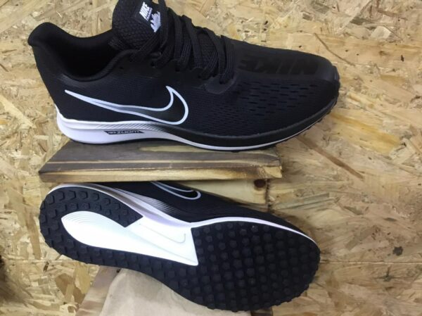 Black Nike Zoom sports shoes