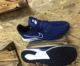 Blue Nike Zoom sports shoes